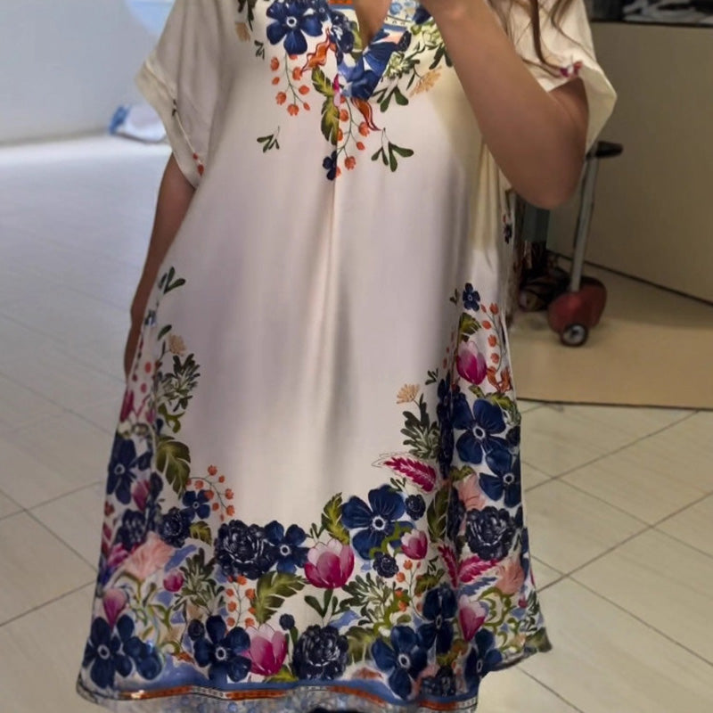 Dress with floral neckline and V neckline