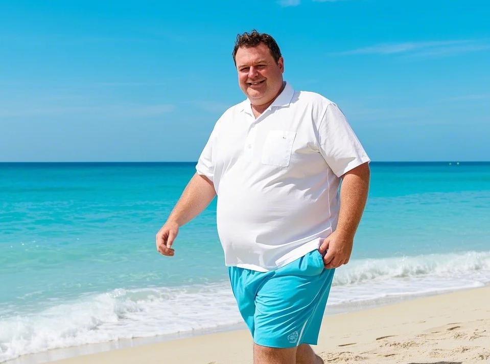 a man having vacation in casual tee and big and tall athletic shorts