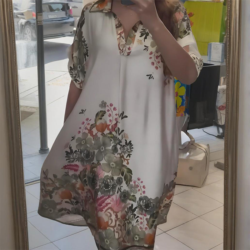 Dress with floral neckline and V neckline
