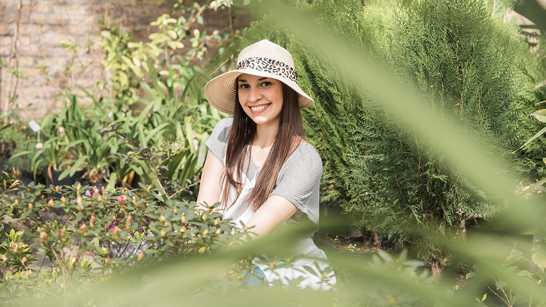 Smiling girl in the garden