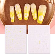 Close-up of floral nail stickers application