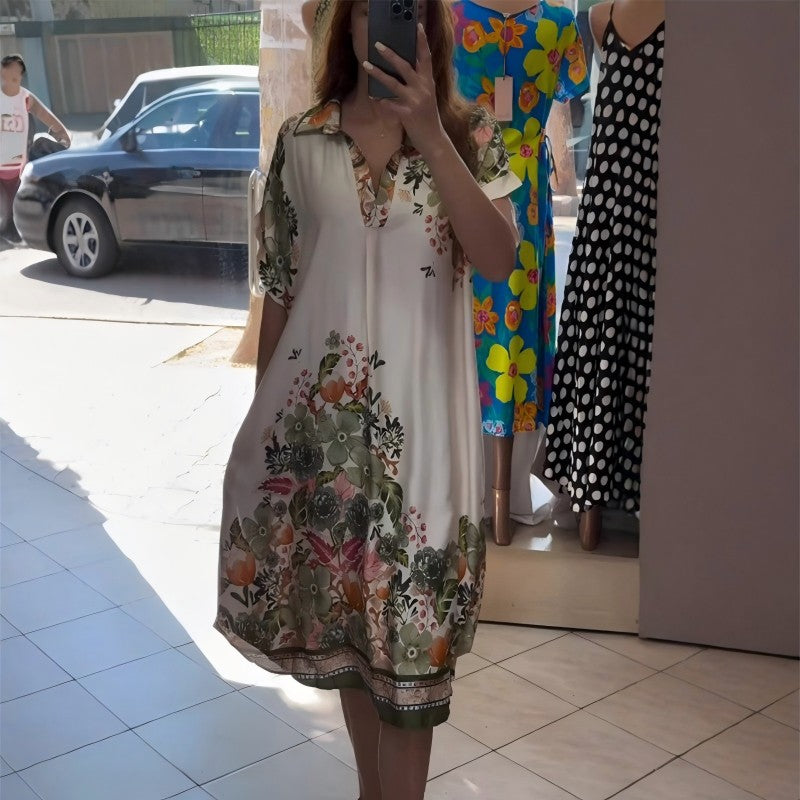 Dress with floral neckline and V neckline