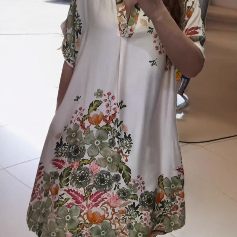 Dress with floral neckline and V neckline
