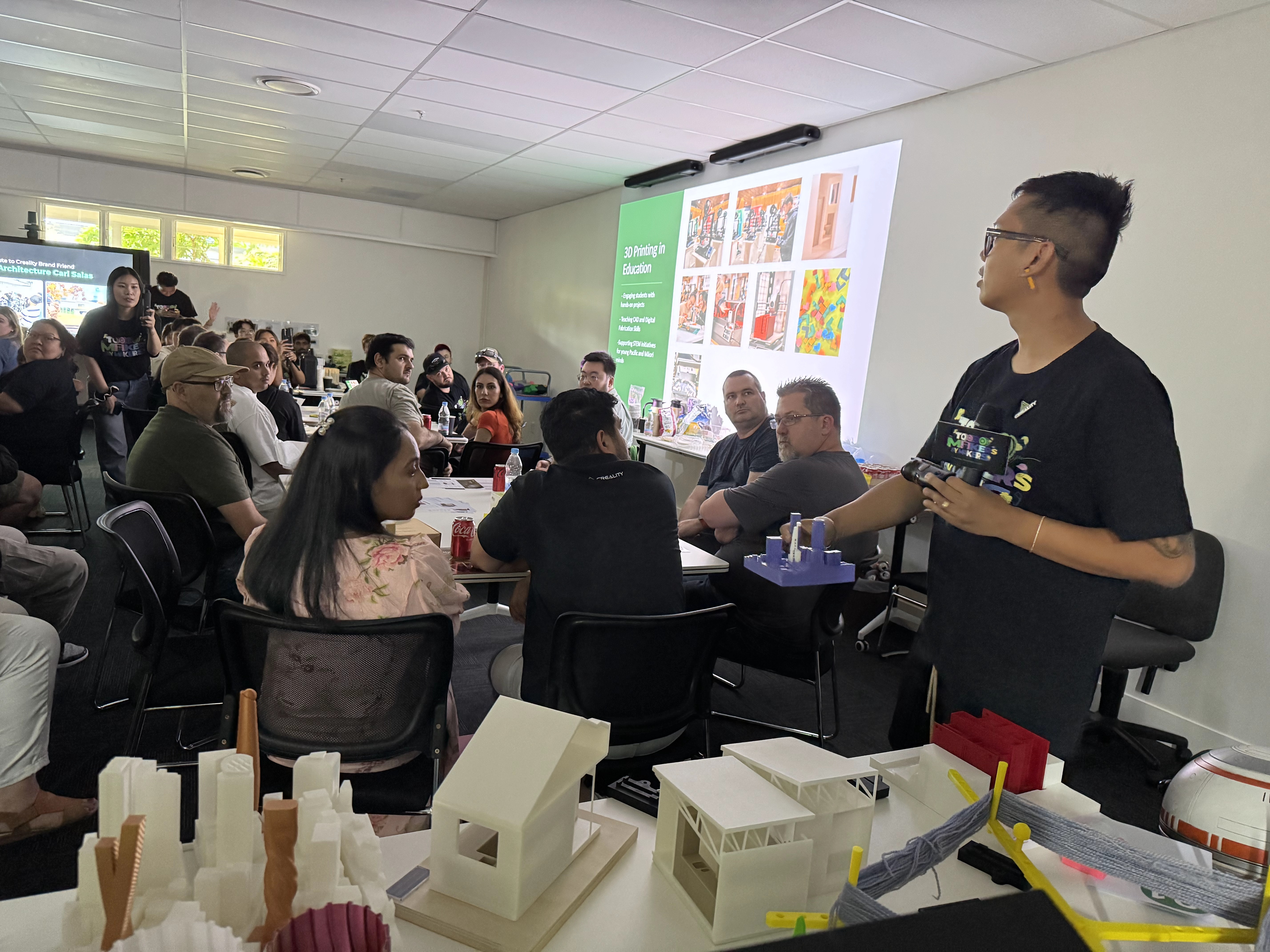 carl salas sharing his architectural models at the pb tech store