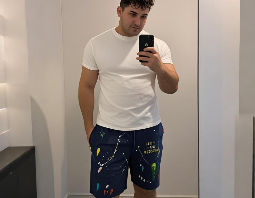 A big and tall man in his trendy shorts