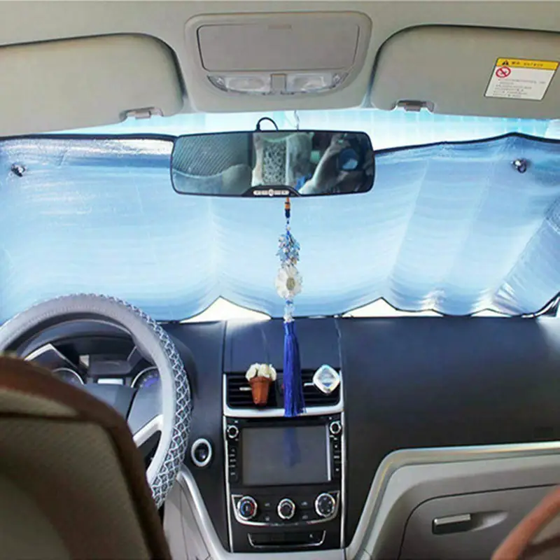 a car windshield sunshade the front window   folded sunshade to prevent ultraviolet   and reduce the temperature inside the car suitable for most vehicles details 1